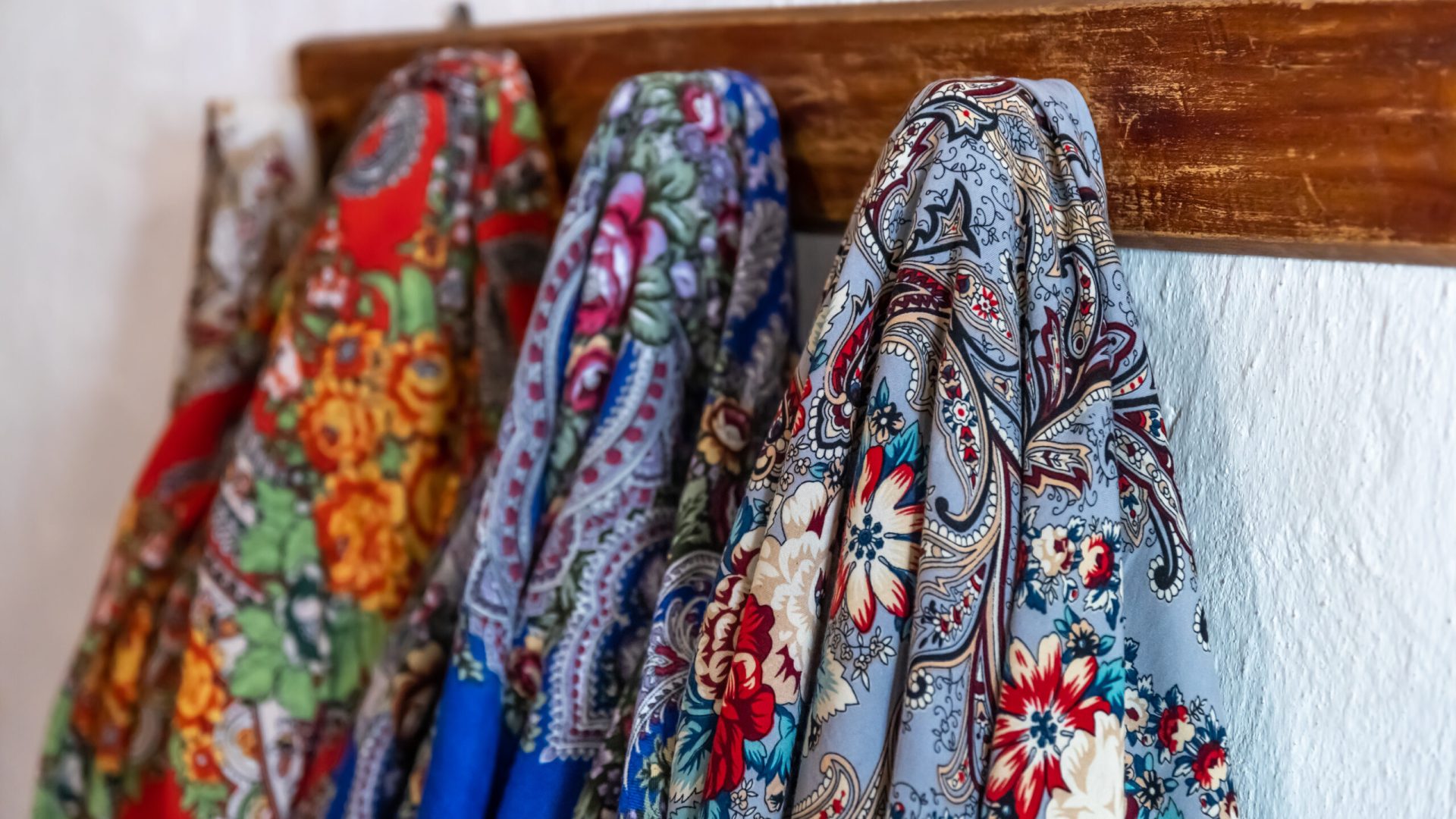 Home layout ukrainian traditional ethnic shawls of different colors and patterns.